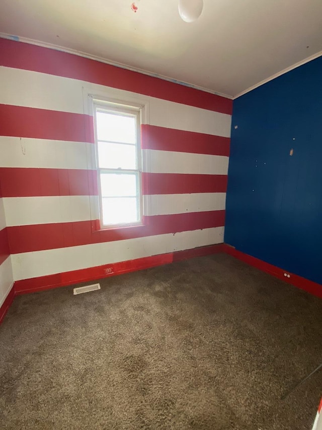1228 Quarry Ave NW, Grand Rapids, MI 49504 - carpeted spare room with ornamental molding and baseboards