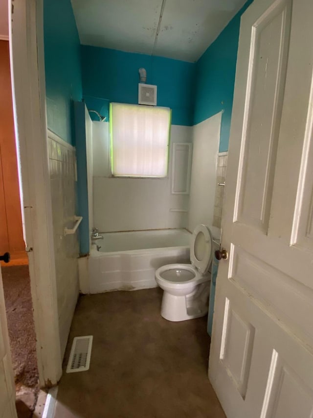 1228 Quarry Ave NW, Grand Rapids, MI 49504 - bathroom featuring shower / bath combination and concrete flooring