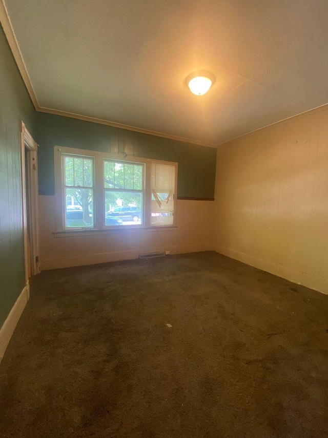 1228 Quarry Ave NW, Grand Rapids, MI 49504 - carpeted empty room featuring baseboards and ornamental molding