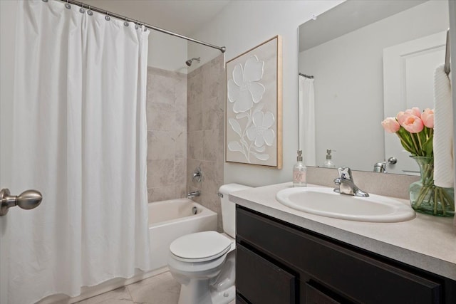 full bathroom featuring shower / bath combo, vanity, and toilet