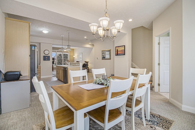 dining area with a chandelier, recessed lighting, baseboards, and stairs