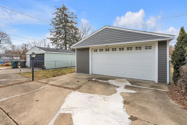 detached garage with fence