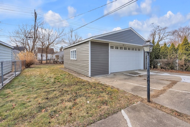 detached garage with fence