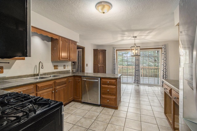 kitchen with dishwasher, brown cabinetry, a sink, and black gas range oven