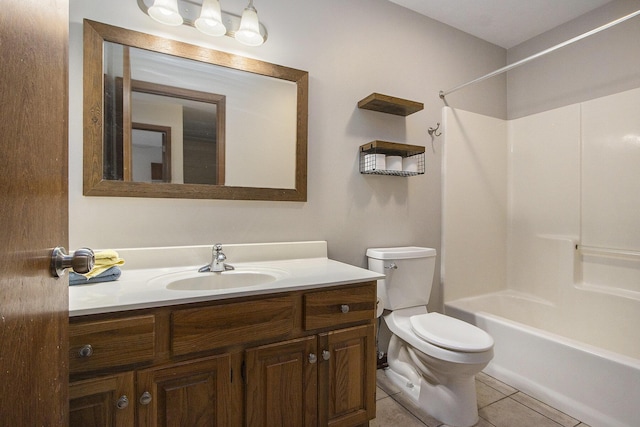 full bathroom featuring vanity, bathtub / shower combination, tile patterned flooring, and toilet