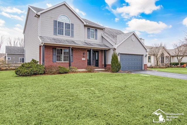 traditional-style home with aphalt driveway, brick siding, a shingled roof, a garage, and a front lawn