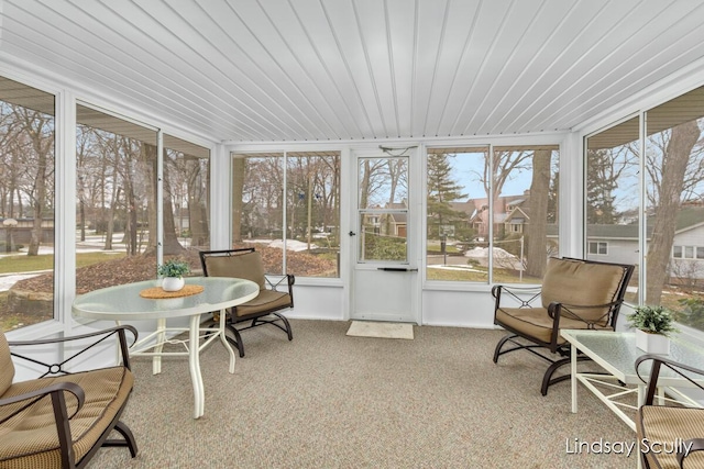 sunroom with wooden ceiling