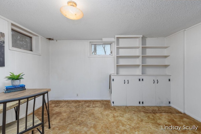 office space featuring a textured ceiling