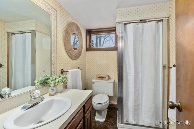 full bathroom featuring vanity, a shower with shower curtain, and wallpapered walls