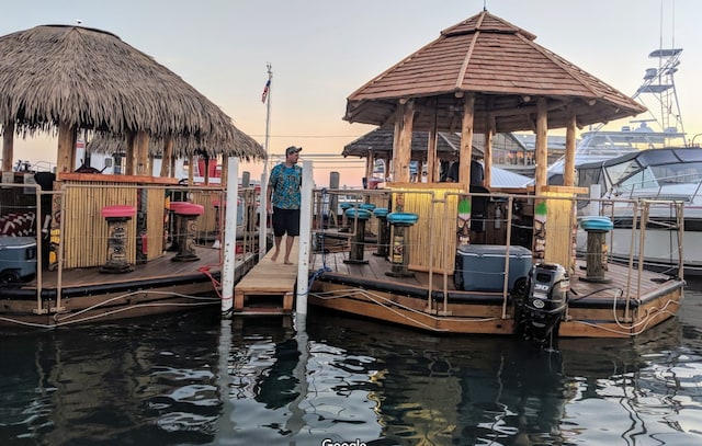 dock area featuring a water view