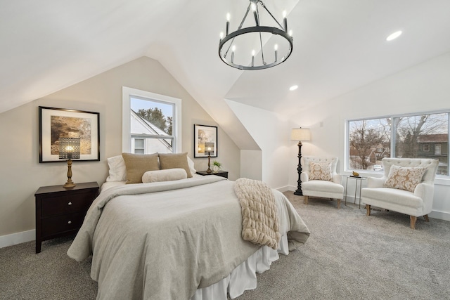 bedroom with vaulted ceiling, carpet flooring, and baseboards