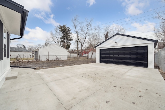 detached garage with fence