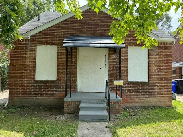 bungalow with brick siding