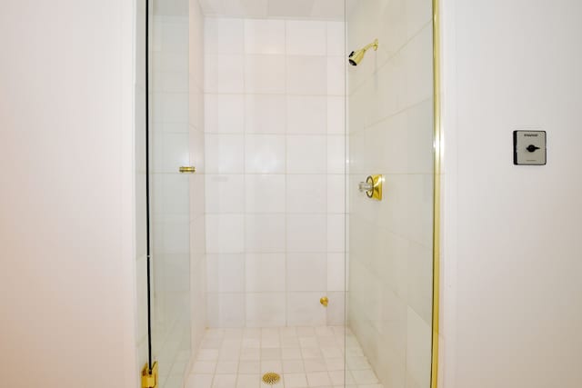 bathroom with a shower stall