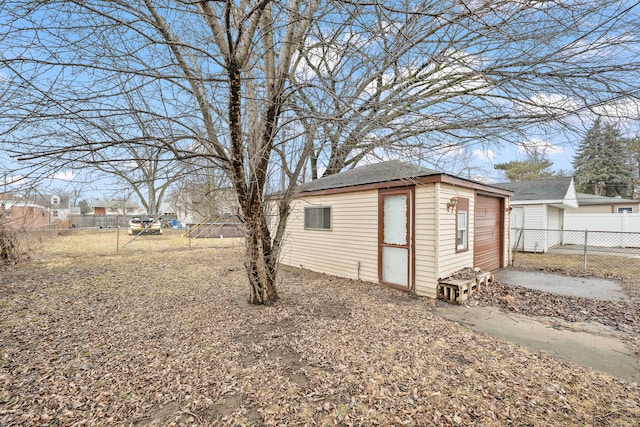 view of outbuilding with an outbuilding and a fenced backyard