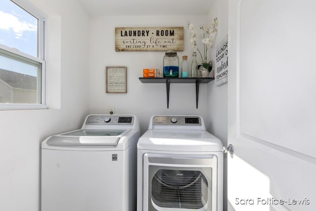 clothes washing area with laundry area and independent washer and dryer