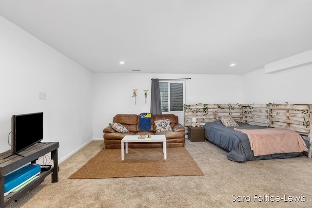 carpeted bedroom with baseboards, visible vents, and recessed lighting