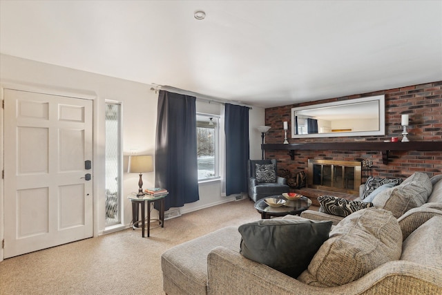 carpeted living room with a fireplace and baseboards