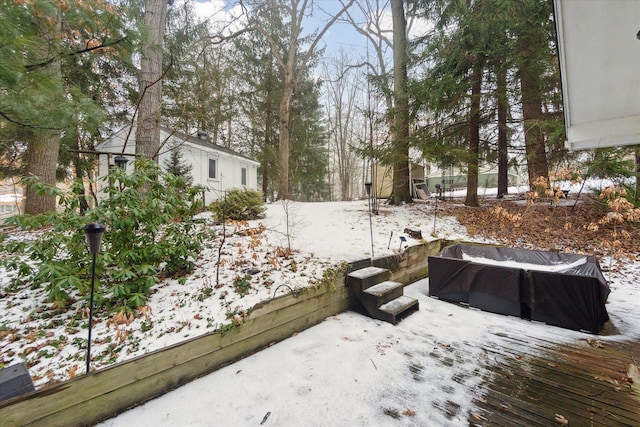 view of yard covered in snow