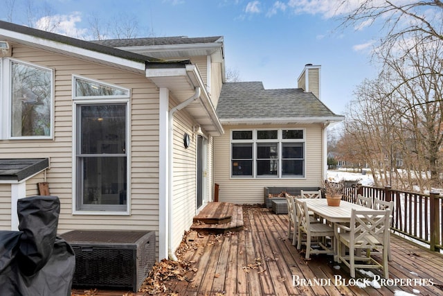 wooden deck with central AC and outdoor dining space