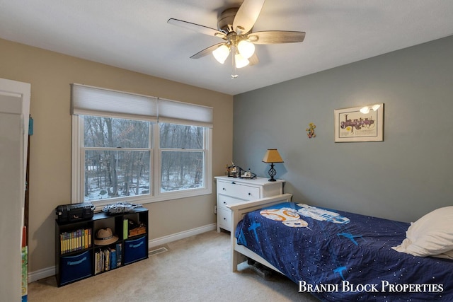 bedroom with carpet flooring, visible vents, and baseboards