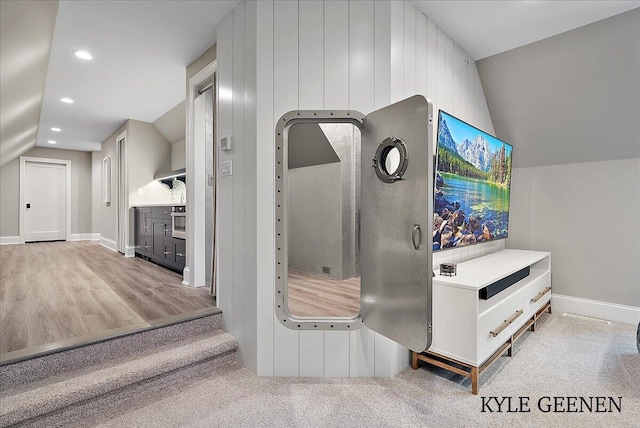 interior space with baseboards and recessed lighting