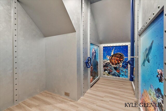 hallway with wood finished floors
