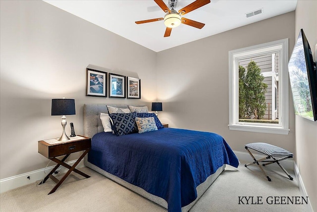 bedroom featuring ceiling fan, carpet floors, visible vents, and baseboards