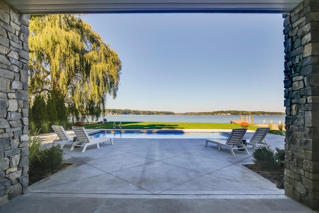 view of patio / terrace with a water view