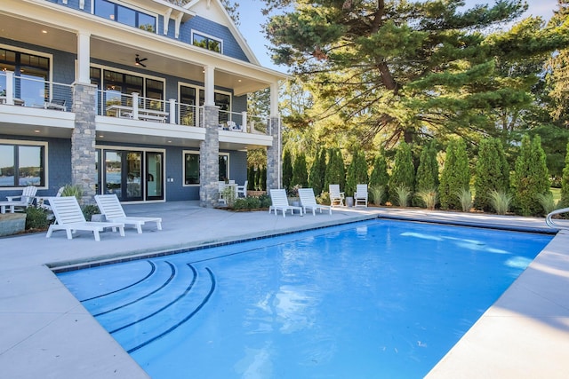 pool with a patio area
