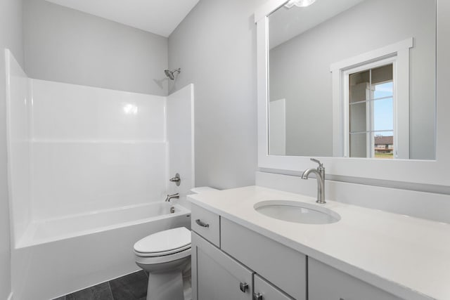 full bath featuring toilet, vanity, and shower / bathing tub combination