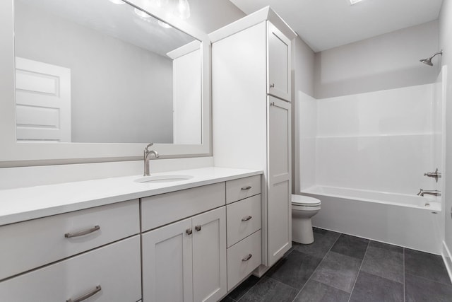 full bath with shower / bath combination, vanity, and toilet