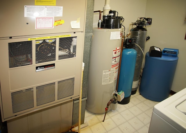 utilities featuring heating unit and gas water heater