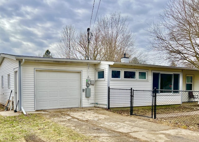 exterior space featuring fence and driveway