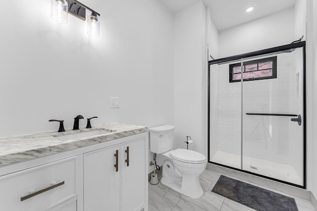 full bathroom with marble finish floor, a stall shower, vanity, and toilet