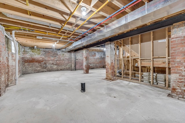 4301 Avery St, Detroit, MI 48208 - unfinished basement featuring brick wall