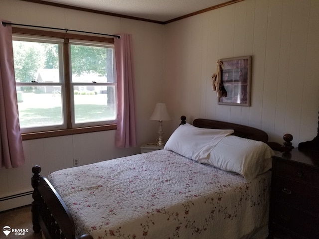 bedroom with a baseboard radiator, ornamental molding, and multiple windows