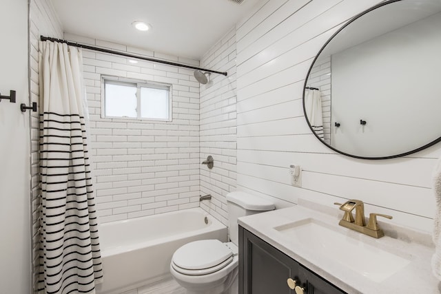 bathroom featuring shower / bathtub combination with curtain, toilet, and vanity