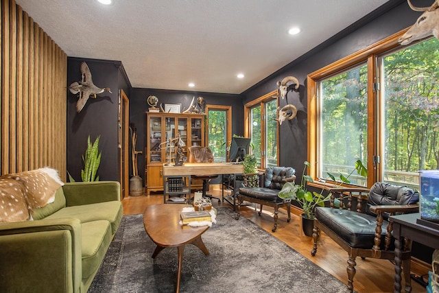 sitting room with recessed lighting and wood finished floors