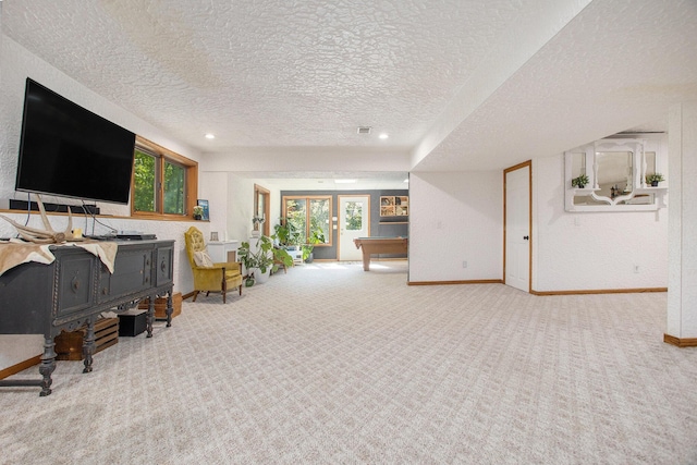 carpeted living area featuring a textured ceiling, pool table, recessed lighting, and baseboards