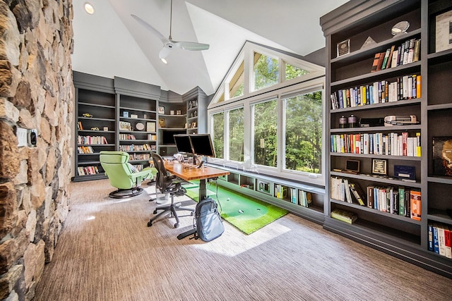 carpeted office featuring high vaulted ceiling, built in features, and a ceiling fan