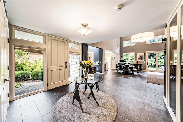 foyer entrance with baseboards