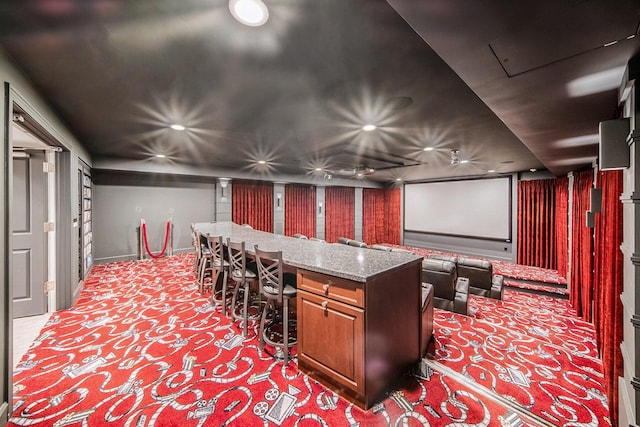 home theater room featuring carpet floors and recessed lighting