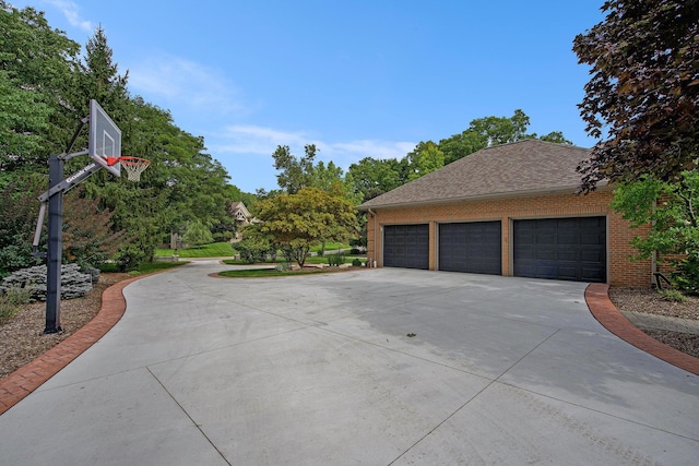 exterior space featuring concrete driveway