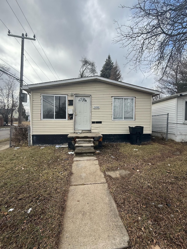 view of front of home with fence