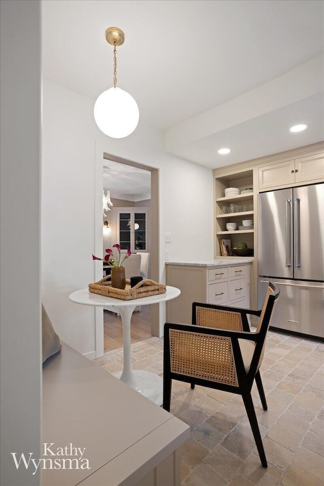 dining room with recessed lighting