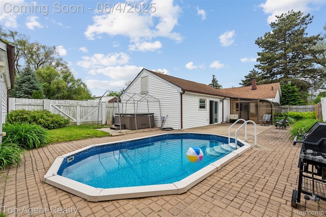 27320 Ryan Rd, Warren, MI 48092 - view of pool with a hot tub, a patio, a fenced backyard, a gate, and grilling area