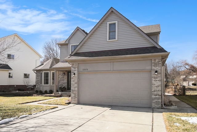 view of front of home featuring driveway, brick siding, roof with shingles, and an attached garage