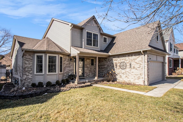 traditional-style house featuring brick siding, roof with shingles, an attached garage, driveway, and a front lawn