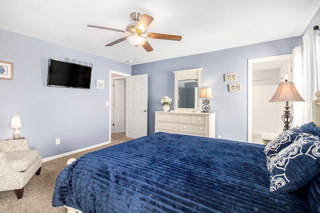 carpeted bedroom featuring a ceiling fan and baseboards